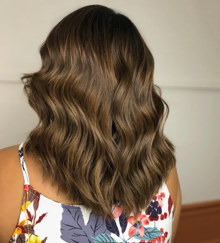 Smooth, glossy hair with a sleek finish